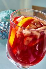 Hot mulled wine in a glass cup