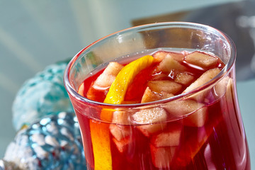 Hot mulled wine in a glass cup