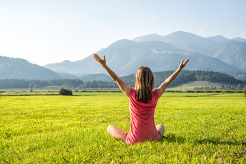 Woman Meditate at the Mountains