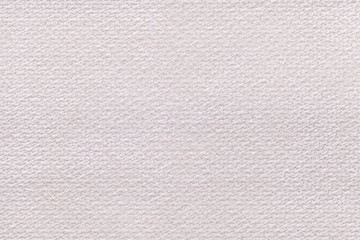 White fluffy background of soft, fleecy cloth. Texture of textile closeup