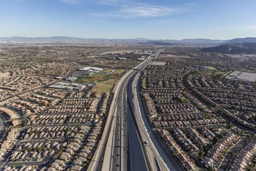 Fotobehang Aerial view of desert suburban sprawl along the 215 freeway in the Summerlin area of Las Vegas, Nevada. © trekandphoto
