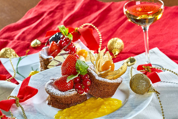 Cupcake with fresh fresh berries decoration on the table