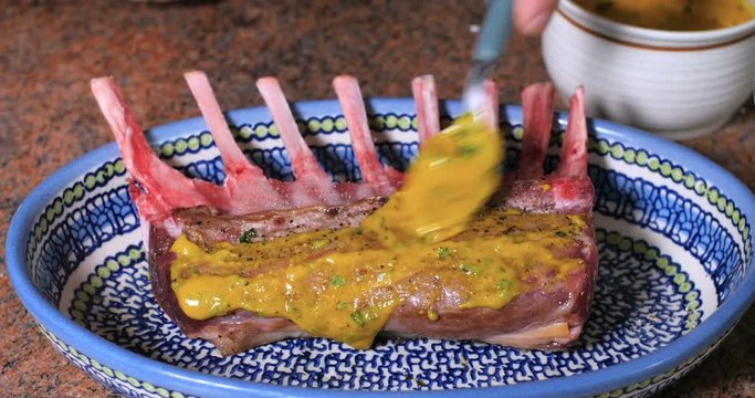 Coating a rack of lamb with mustard and breaded mint crust