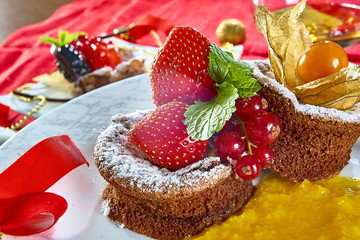 Cupcake with fresh fresh berries decoration on the table
