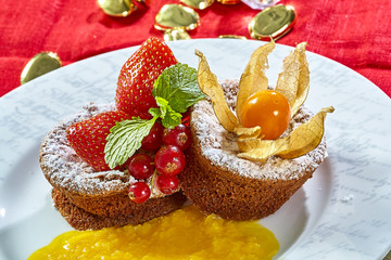 Cupcake with fresh fresh berries decoration on the table