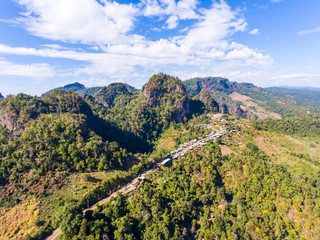 Fototapeta na wymiar Aerial view of small village on green mountain