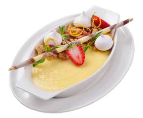 lemon cream with strawberries and mint leaves