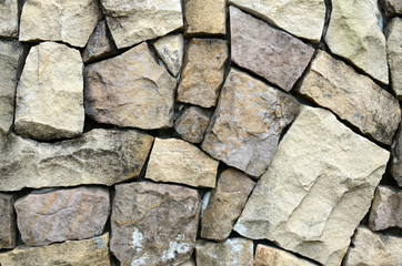 Irregular yellow and brown rocks image