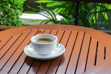coffee espresso on the wood floor background