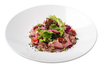 salad with roast beef, tuna and anchovy sauce. Isolated