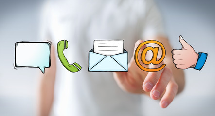 Businessman touching manuscript contact icon with his finger