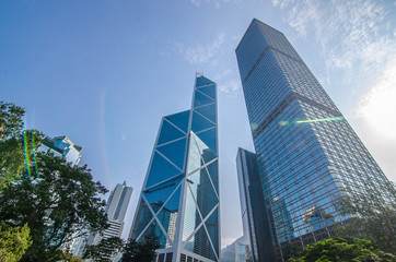 Naklejka premium Modern buildings of Bank of China Tower and Cheung Kong Centre are one of the tallest skyscrapers in Hong Kong.