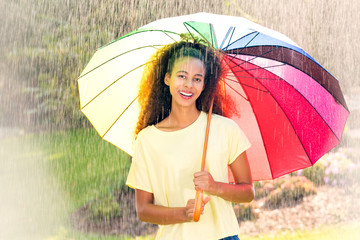Beautiful afroamerican woman with umbrella