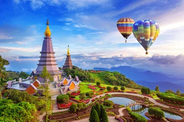 Tuinposter Landmark pagoda in doi Inthanon national park with Balloon at Chiang mai, Thailand. © tawatchai1990