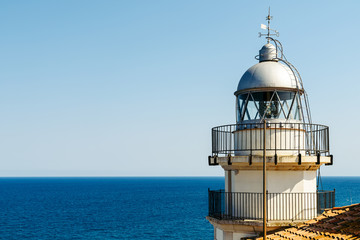Fototapeta na wymiar Lighthouse With Mediterranean Sea As Background