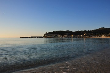 Fototapeta na wymiar Early morning in Marina di Campo beach, Elba island, Italy