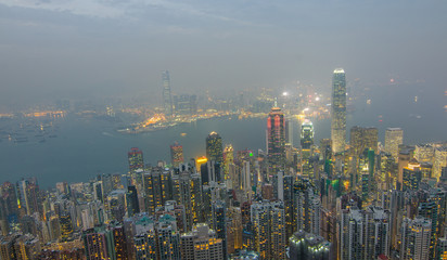 Hong Kong the scenes, victoria harbour from the peak bird view, in the mist with bad weather in the...
