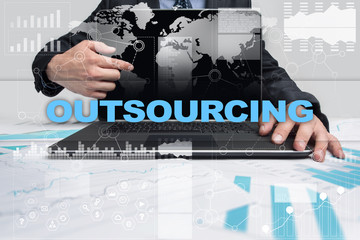 Businessman presenting outsourcing concept.