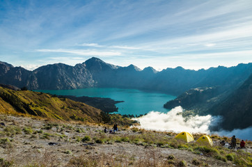 Mount Rinjani, Lombok, 6 AUG, 2015: Setup tent and prepare for overnight at Mount Rinjani Base Camp. The mountain is the second highest volcano in Indonesia and rises to 3,726 metres (12,224 ft).