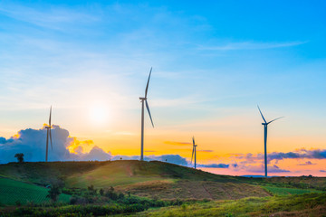 Windmills for electric power production in sunset sky at Khao Kho, Phetchabun, Thailand