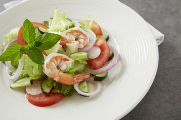 Salad of vegetables and boiled shrimp