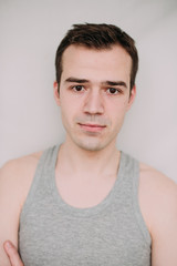 Obraz premium Close up portrait of a handsome young man on white