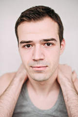 Obraz premium Close up portrait of a handsome young man on white