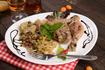 chicken legs with potatoes and aromas
