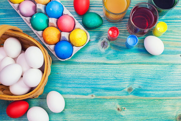 Fototapeta na wymiar Coloring and Decorating Easter Eggs