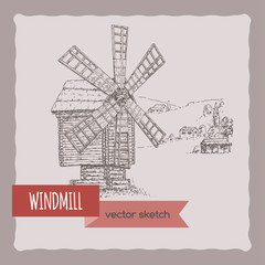 Wooden windmill and hill landscape hand drawn vector sketch.