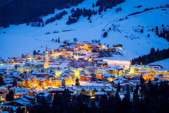 Town, Gallio, Altopiano of Asiago, Province of Vicenza, Veneto, Italy. Mountain ski resort during blue hour.