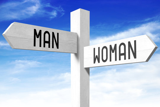 Man, woman - wooden signpost