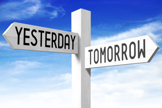 Tomorrow, yesterday - wooden signpost