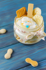 Delicious curd dessert with banana and caramel
