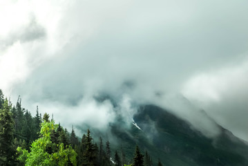 Kenai Alaska mountain enshrouded i clouds