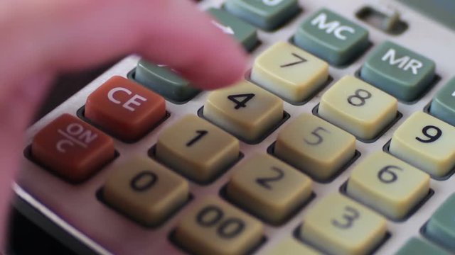 Old vintage calculating machine close up