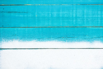 Blank teal blue wood sign with sand border