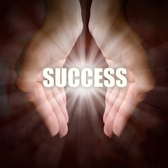 Hands Holding Words - Success