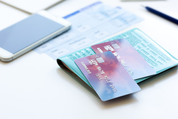 Payment online concept with cards and tickets on light table