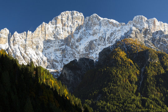Scenic view of snowcapped Monte Civetta against clear sky