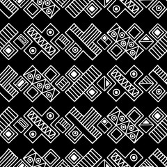 Seamless vector pattern. Black and white geometrical background with hand drawn decorative tribal elements. Print with ethnic, folk, traditional motifs. Graphic vector illustration.