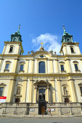 Fototapeta na wymiar WARSAW, POLAND - AUGUST 23, 2014: Towers of a cathedral church of the Sacred Cross