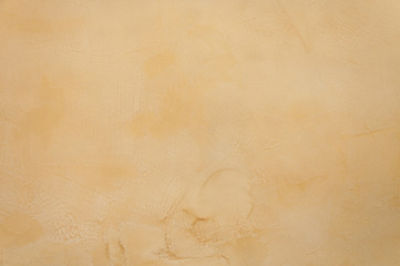Texture of a  yellow brown concrete as a background,yellow brown grungy wall - Great textures for background