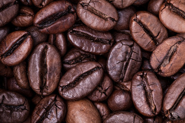 Close up Grains from coffee the top view, horizontal photo. Roasted coffee beans background concept. 