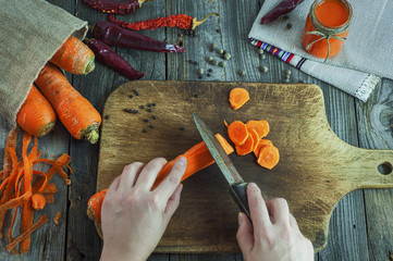 Sliced fresh carrots on a kitchen board