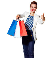 Woman showing French flag colours shopping bags and thumbs up