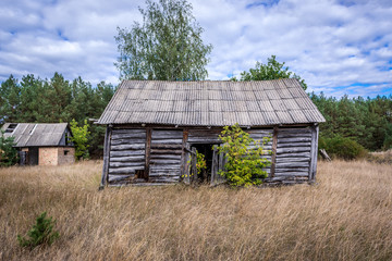 Wooden building in abandoned Masheve settlement, Chernobyl Exclusion Zone, Ukraine