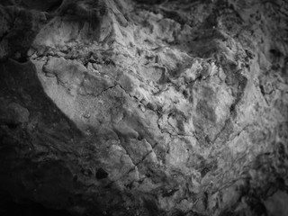 Black stone natural texture background surface, close up image