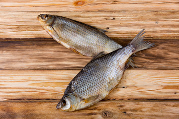Dried fish on wooden table