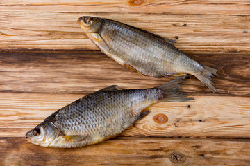 Dried fish on wooden table